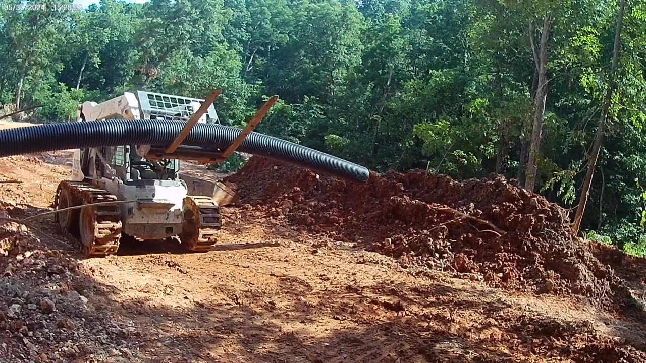 Culvert pipe and ramp to the lateral field