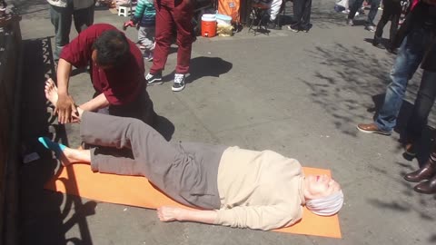 Luodong Massages Elderly Buddhist Woman On Sidewalk