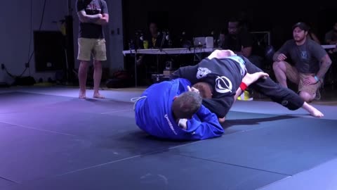 BJJ GI match 4 blue betls