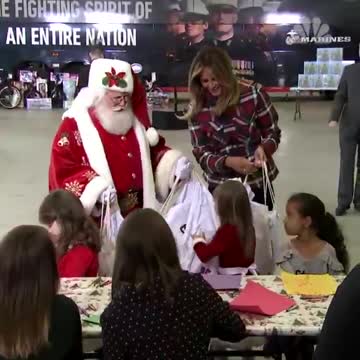 Melania Trump handing out toys at Toys for Tots event