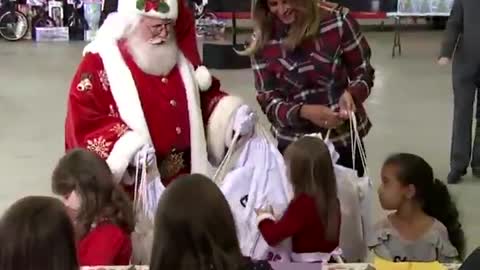 Melania Trump handing out toys at Toys for Tots event