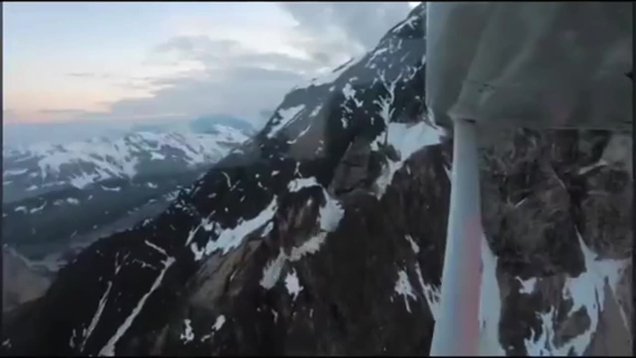 Pilot Flies Over Antartica Ice Walls - Whole New World