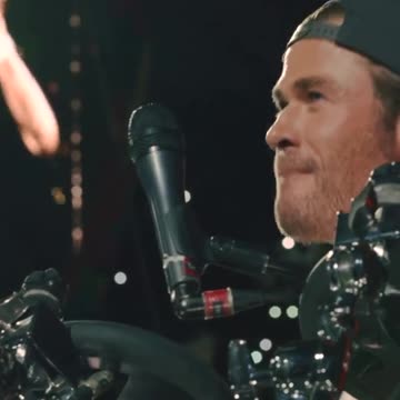 Chris hemsworth surprises Ed Sheeran fan as he plays the drums