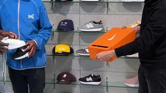 The boy's magic shoes at the scene are confused by everyone around him