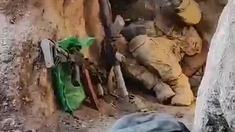 "Close Call: Ukrainian Troops Narrowly Escape Russian Bomb While Taking Cover in a Trench"