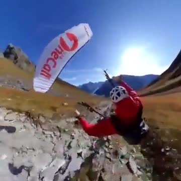 Dangerous paragliding among the rocks