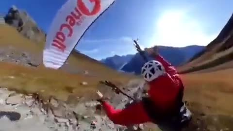 Dangerous paragliding among the rocks