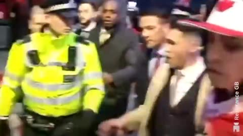 Conspiracy theorists chase Keir Starmer into a police car
