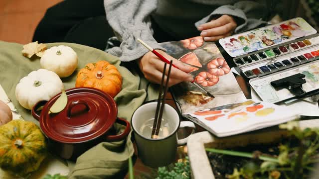 Person Making an Artwork