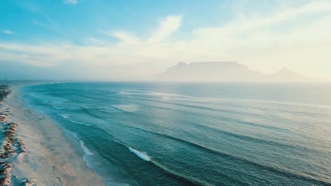 Sea Waves Kissing The Coastline.