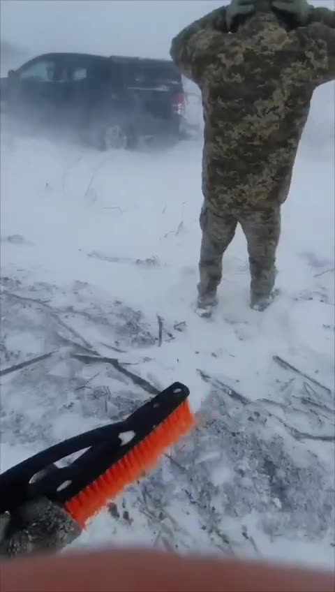 Ukrainian Soldiers Rescue Russian Soldier Stranded in a Storm