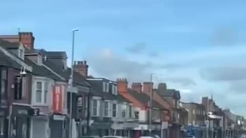 English patriots enter an Islamist town, remove all Palestinian flags put up English flags