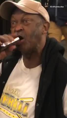 Nsfw man swing brown alcohol bottle in mouth