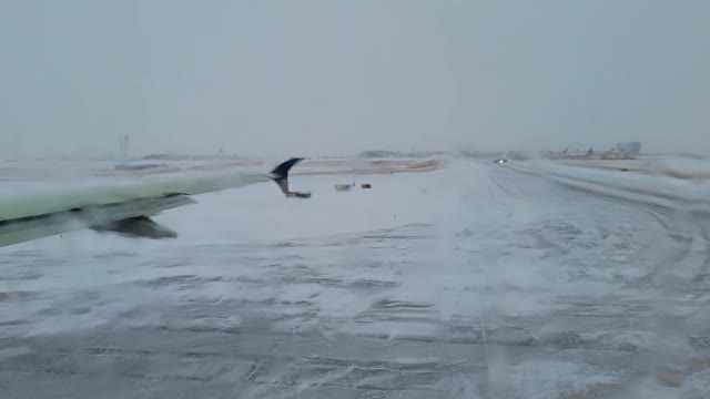 Icy takeoff roll from DEN