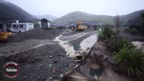 Nelson resident on badly flood-damaged street