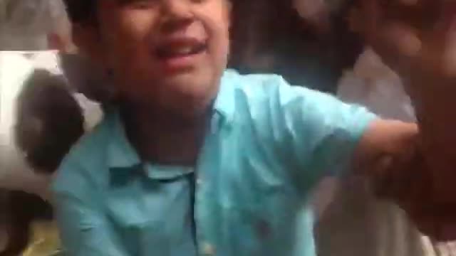 Boy Crying and Trying to Save Goat Fom Slaughter