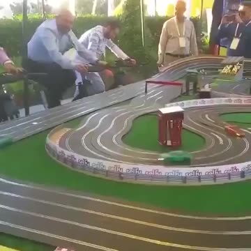Crazy slot car race powered by bicycles