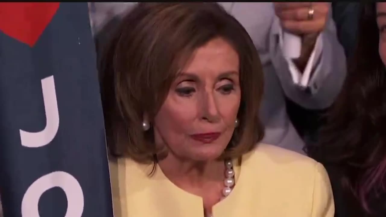 guilty looking Crazy Nancy chants “We Love Joe” just weeks after removing him from the ticket.