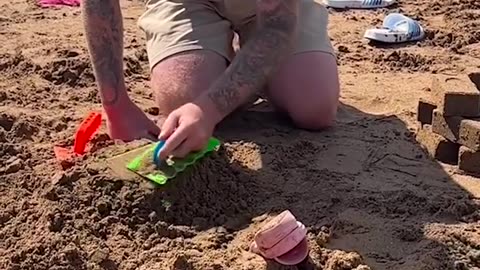 Builder Boyfriend Builds Bricks At The Beach