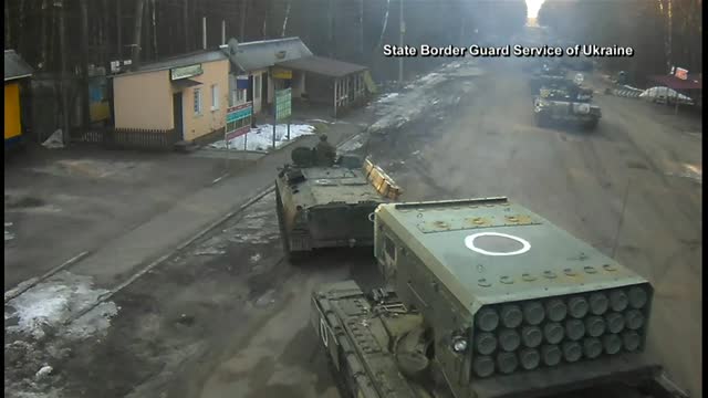 Ukraine under attack by Russia , tanks on roads