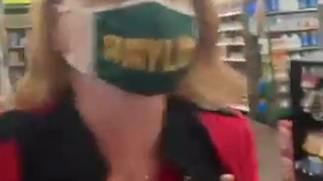 Woman harasses a couple in a supermarket and makes out they're crazy for not wearing face masks.