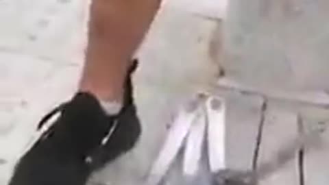 Cuts wood with his feet