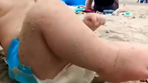 baby funny reaction on beach !!