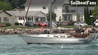 Rapscallion II Sailboat Cruising Down St Clair River In Great Lakes