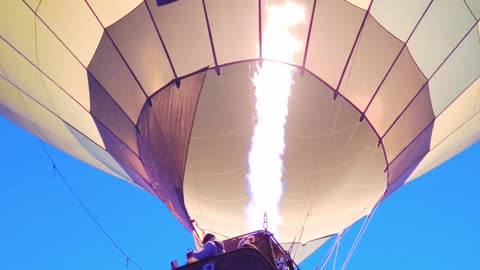 Balloon flying in the sky - catching air