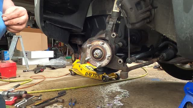 Part 2 Replacing lower control arm 2013 Kia Sorrento.