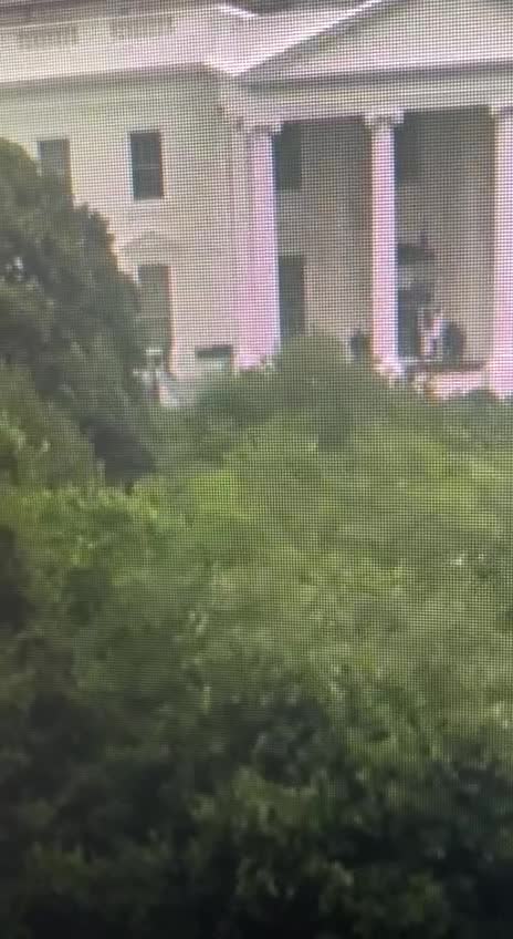 Who Or What Is Being Rolled Out Of The White House In What Appears To Be A Body Bag?