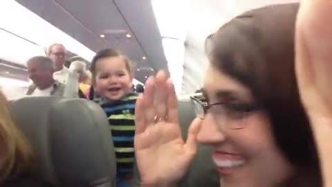 Laughing Baby on Airplane -- So Cute!!