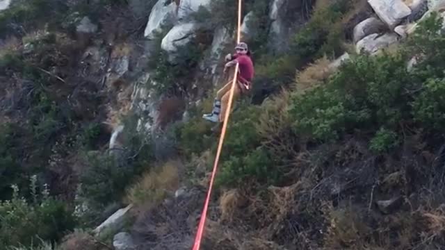 Nsfw backwards zipline red shirt guy shot guns beer