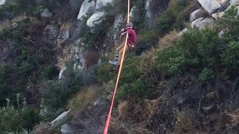 Nsfw backwards zipline red shirt guy shot guns beer