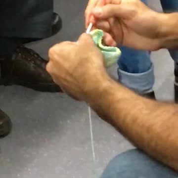 Red shirt guy crotchets on subway