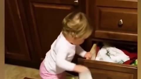 baby helps mom