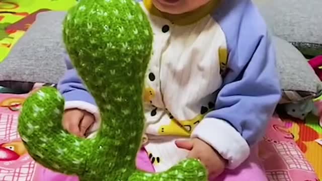 adorable baby making a lot of laugh