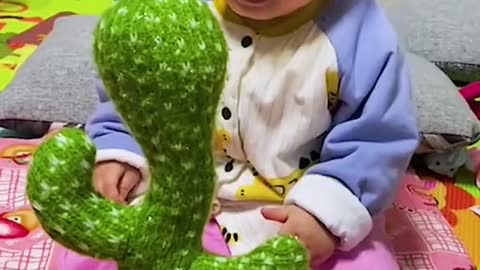 adorable baby making a lot of laugh