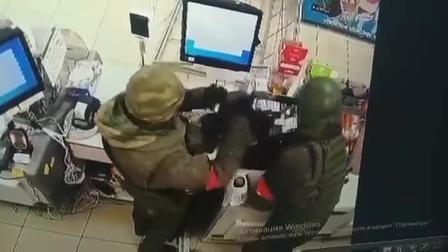 Russian soldiers rob a store in the Kiev region, Trostyanka.