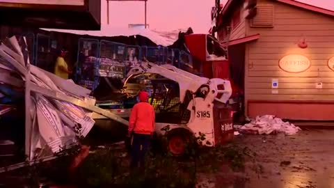 Amazon truck full of packages hydroplanes off I-35, crashes into Grady’s BBQ res