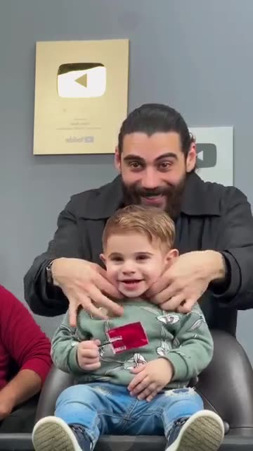 Cute baby cutting hair