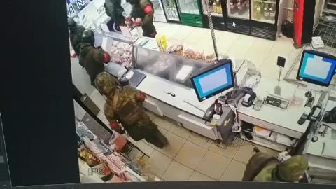 Russian soldiers looting Ukrainian convenience store