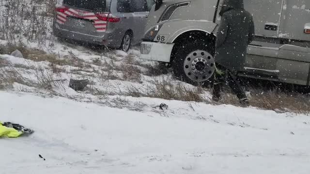 Pileup Surrounds Untouched Tractor Trailer