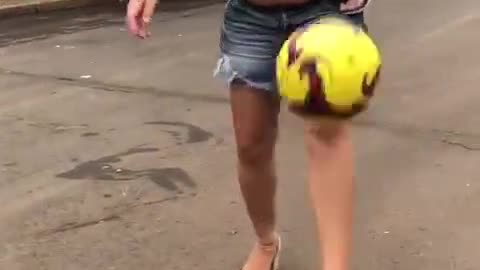 Pregnant lady juggling football