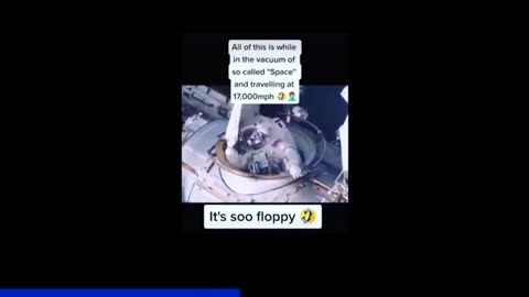 Astronaut Fumbles With Phoney Cardboard Hatch