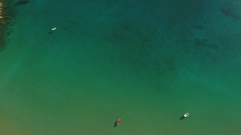 Small boats in the ocean