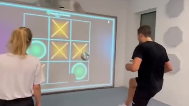 Couple plays X O