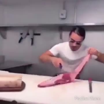 Man flings meat at child