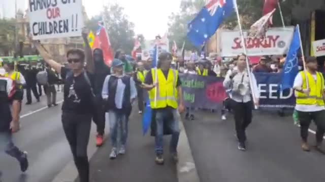 Melbourne Australia - Protesters march down the CBD chanting Free our Children Yesterday