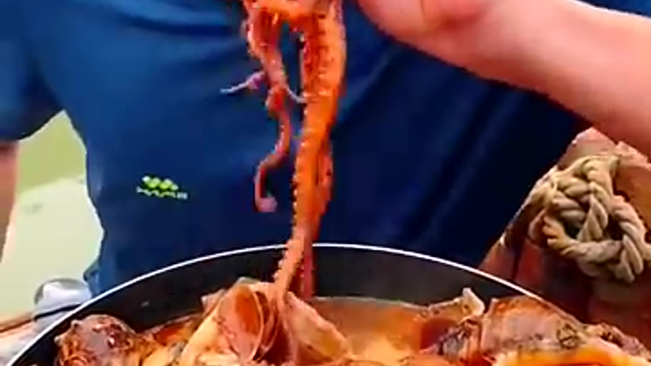 Chinese fisherman cooking and Eating fresh seafood...